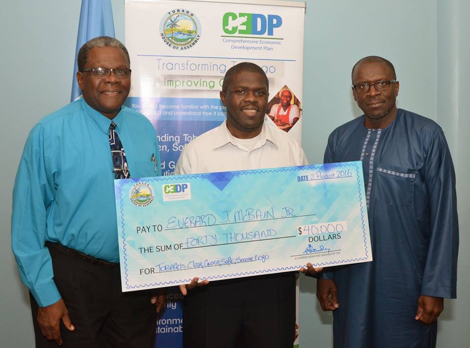 The prize giving ceremony for the winner of the Tobago branding contest. L-R: CEDP Coordinator, Dr. Elton Bobb; Everard J. McBain Jr., GemGfx; Tobago House of Assembly's Chief Administrator Raye Sandy.